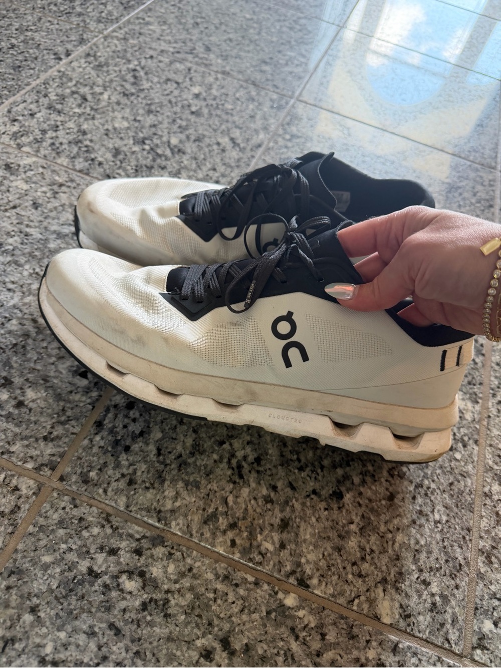 On Running Men's White and Black Athletic Shoes